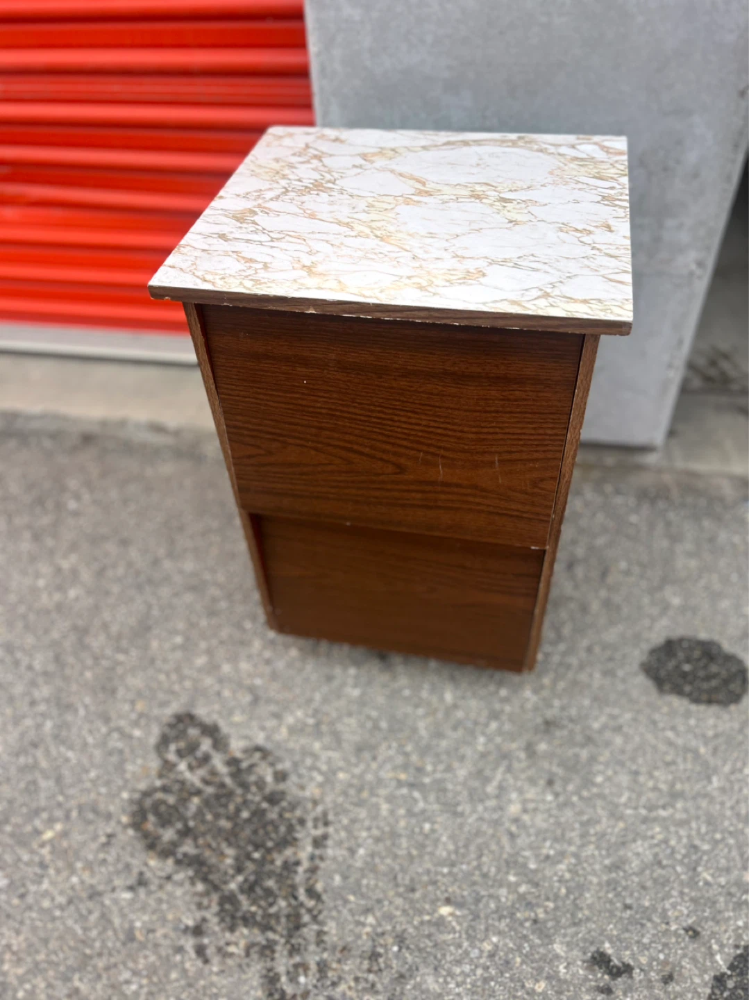 Small wooden side table with marble top