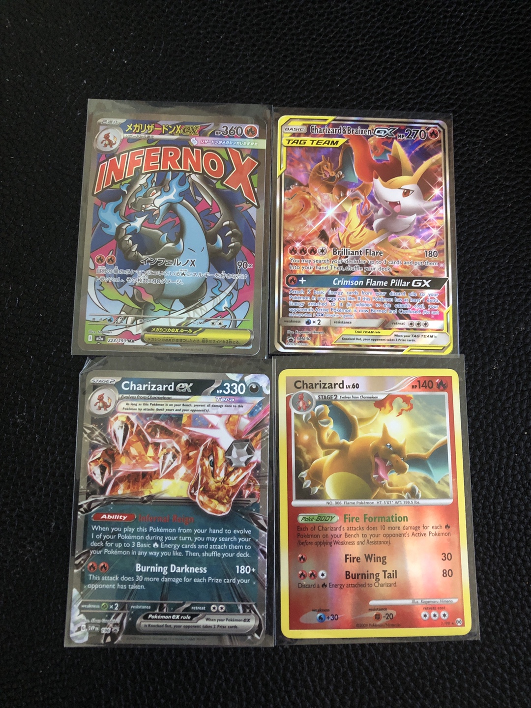 Lot of 4 Charizard Pokemon Cards