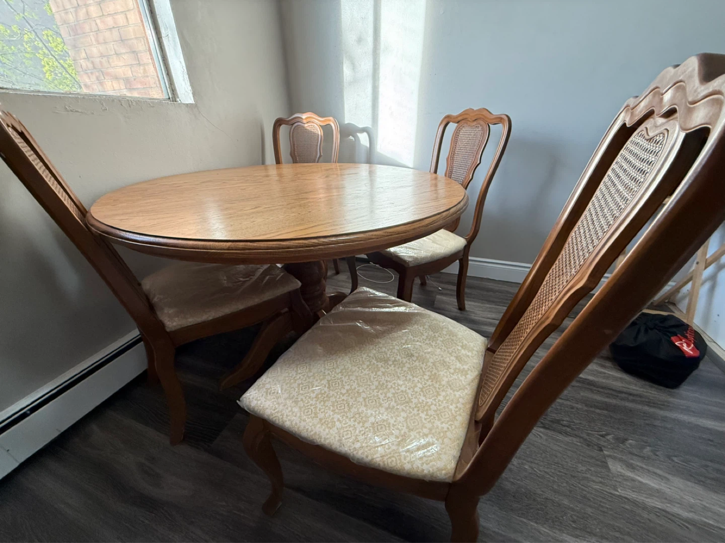 Round Wood Dining Table and 4 Cane Back Chairs Set - photo 4