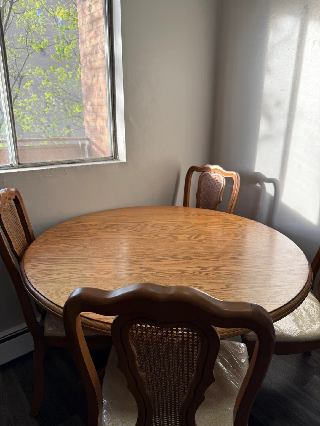 Round Wood Dining Table and 4 Cane Back Chairs Set