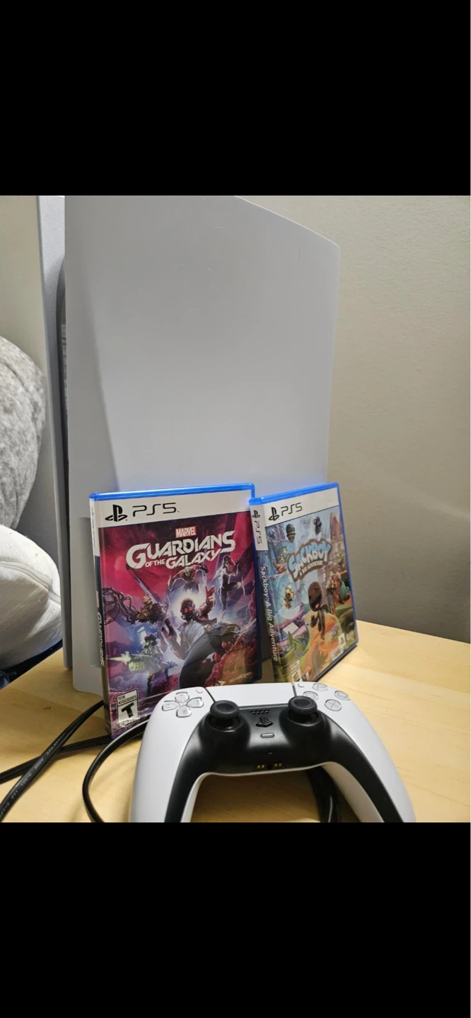PlayStation 5 Console with Controller and Two Games