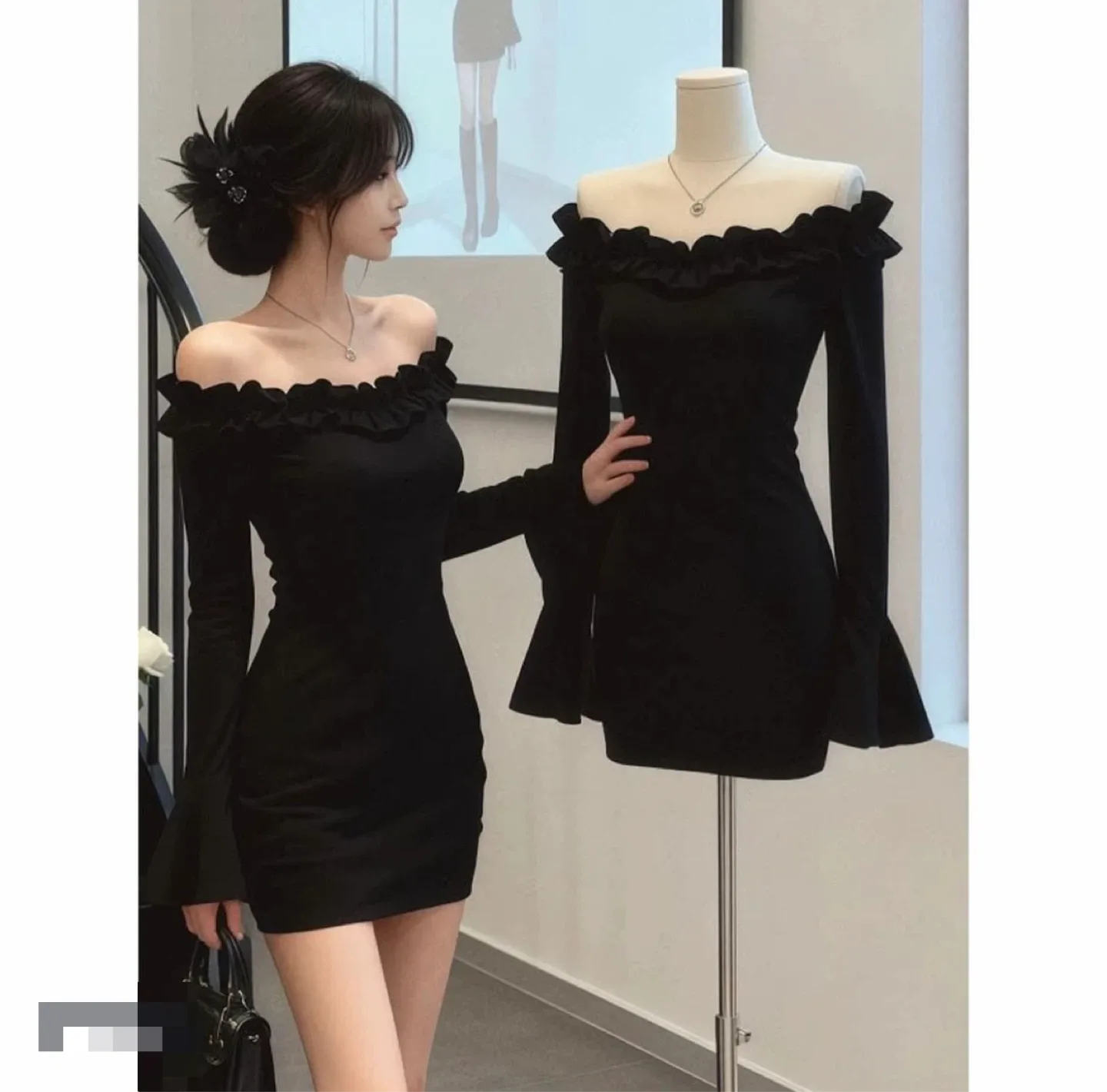 Black off-the-shoulder ruffled mini dress