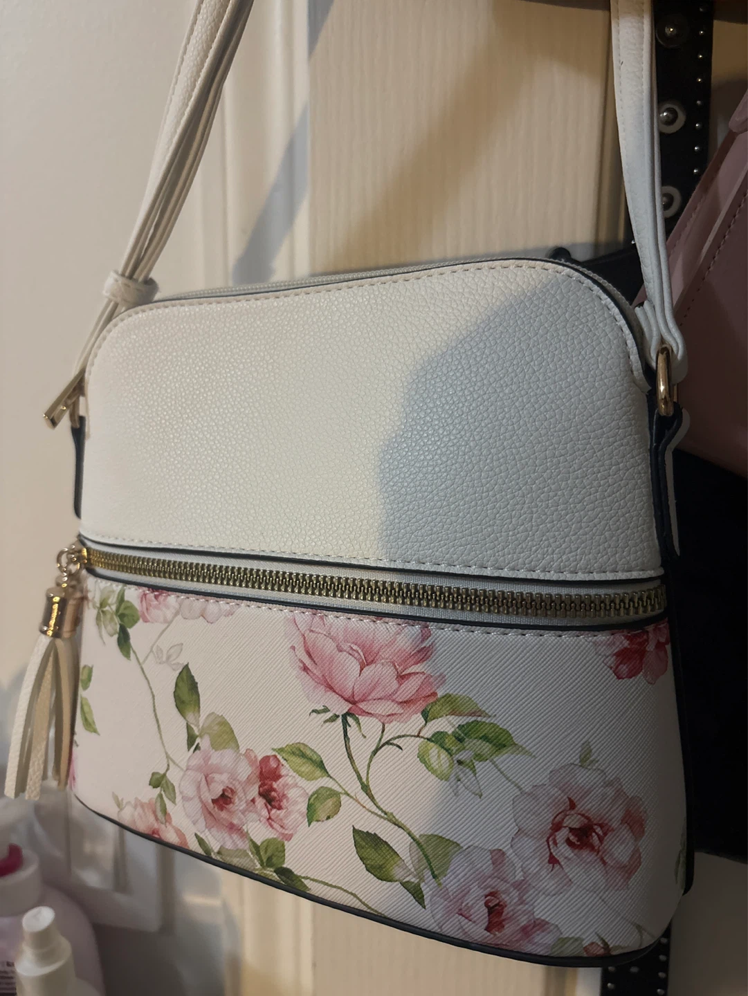 White dome crossbody bag with floral print