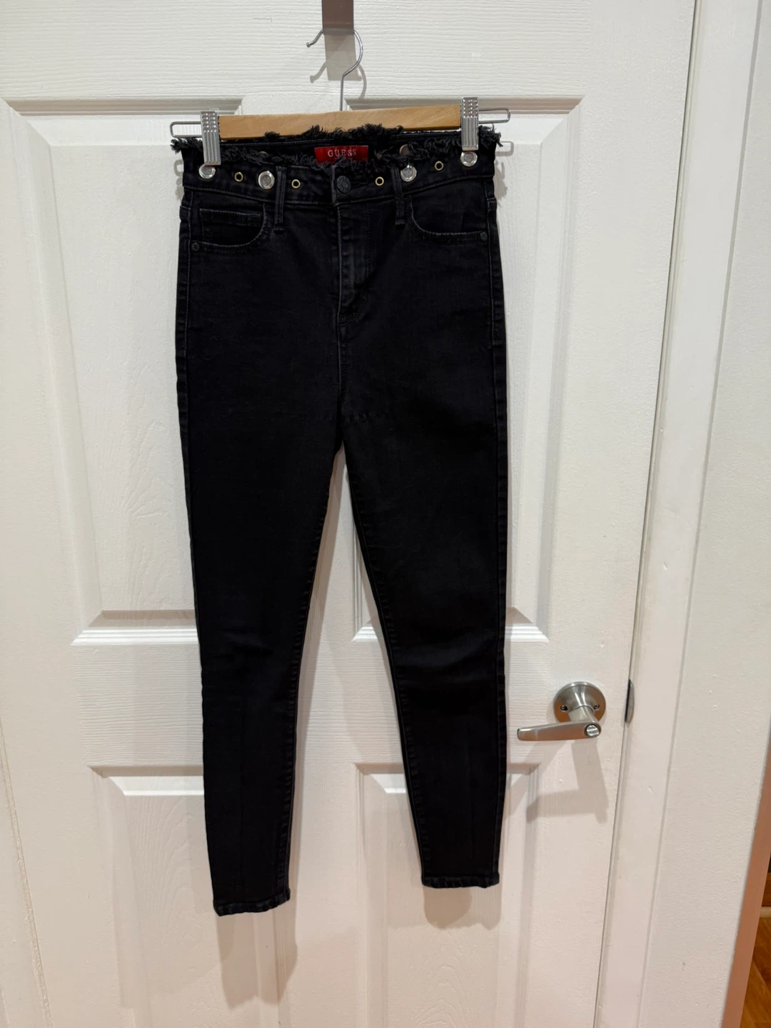 Women’s black Guess jeans
