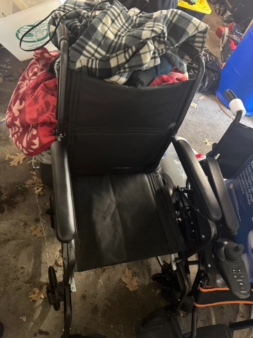 Black manual lightweight wheel chair (located in elmont ny) - photo 2