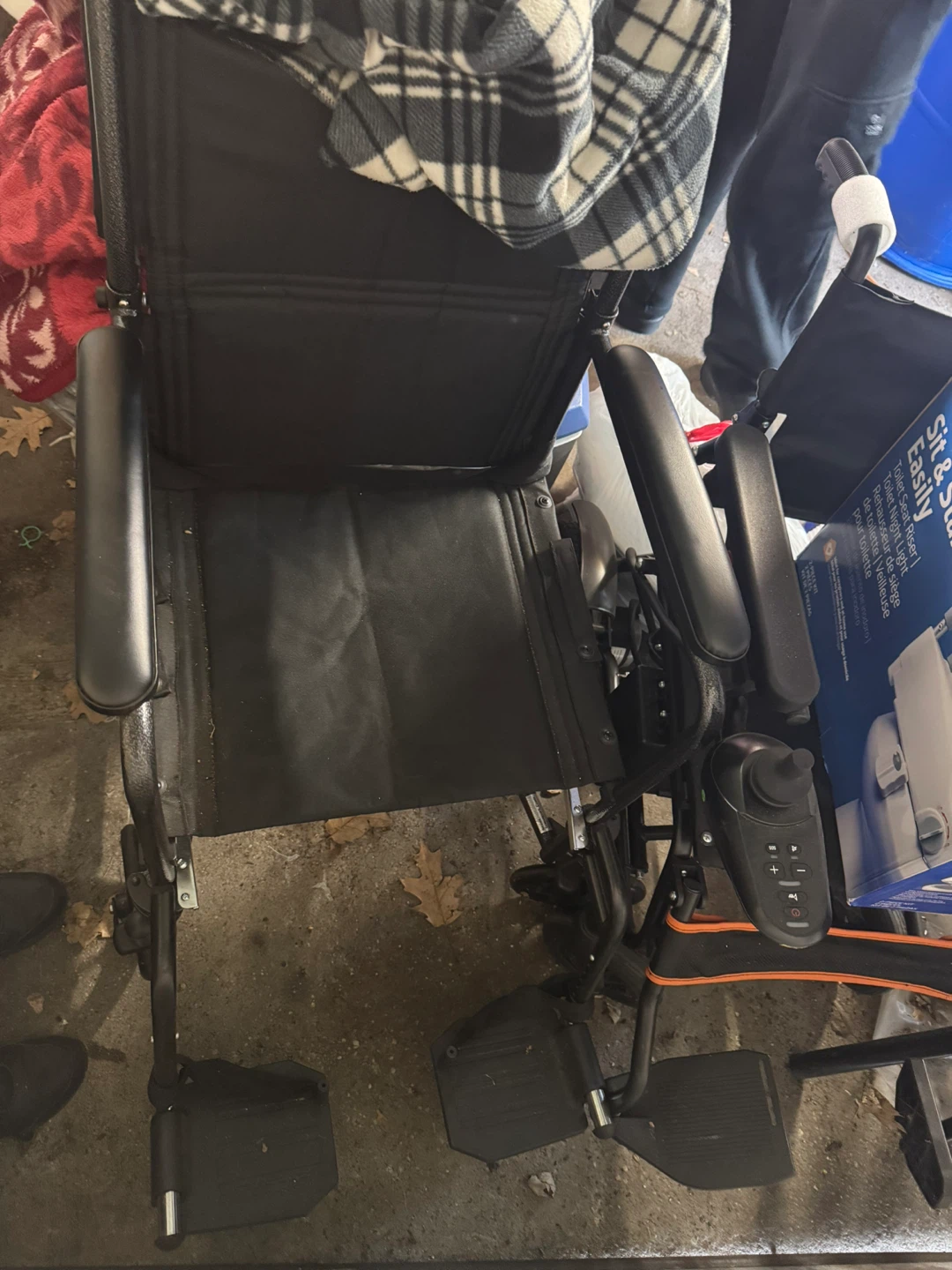 Black manual lightweight wheel chair (located in elmont ny)