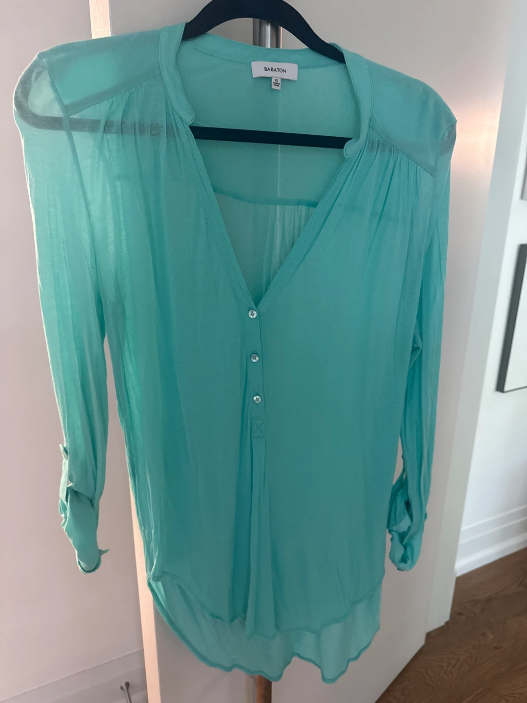 Babaton shirt. Button up sleeves.