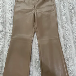 Aritzia/ The Melina Faux Leather Flare Pants - Tan