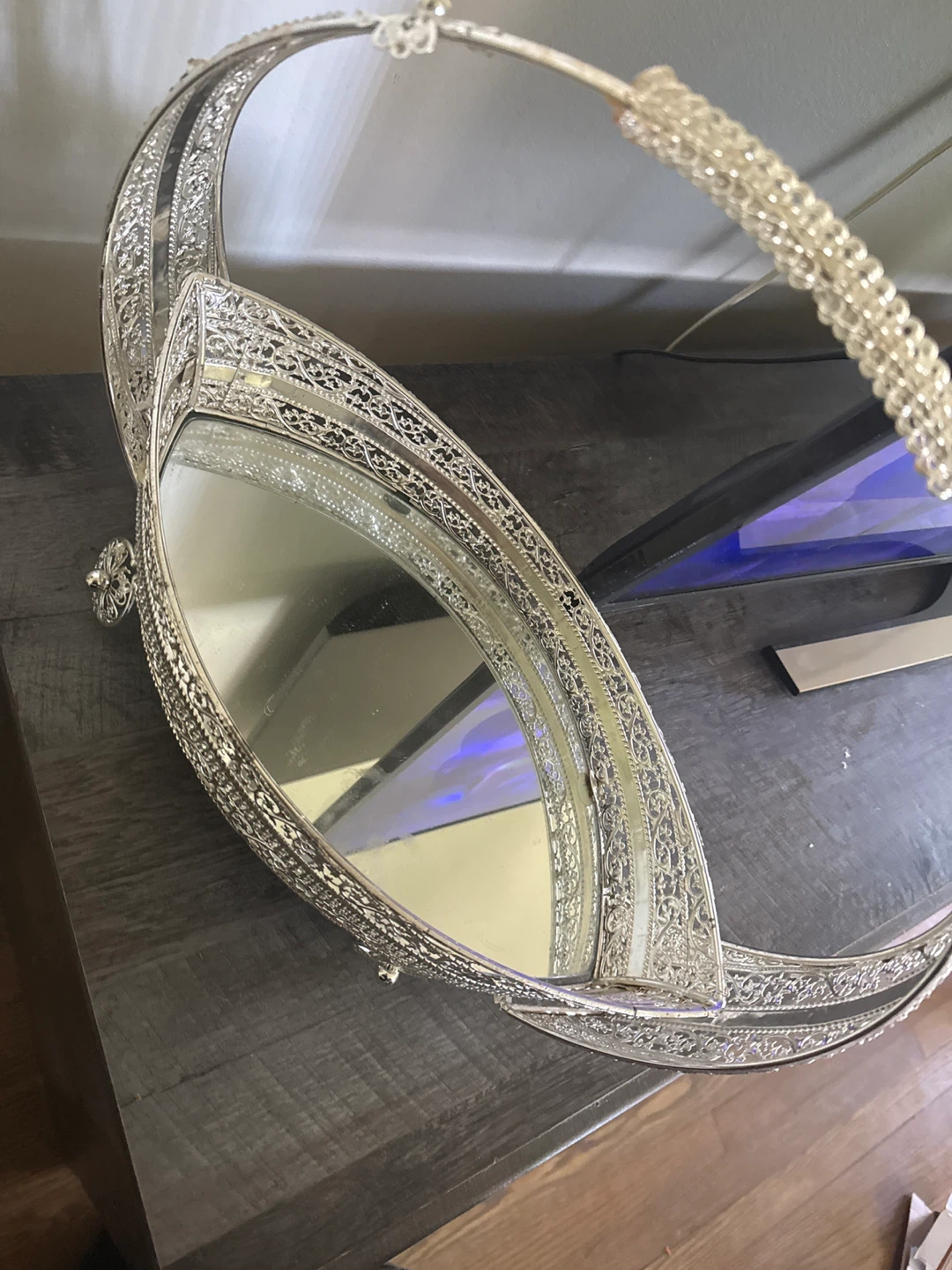 Silver decorative tray with mirrored base and handle