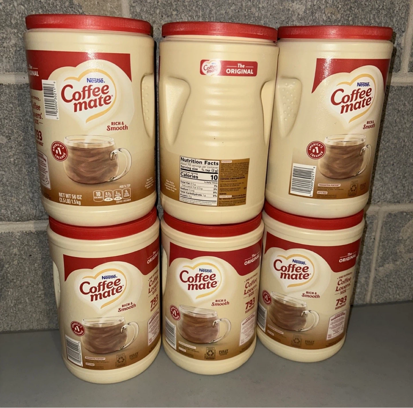 Empty coffee creamer plastic containers