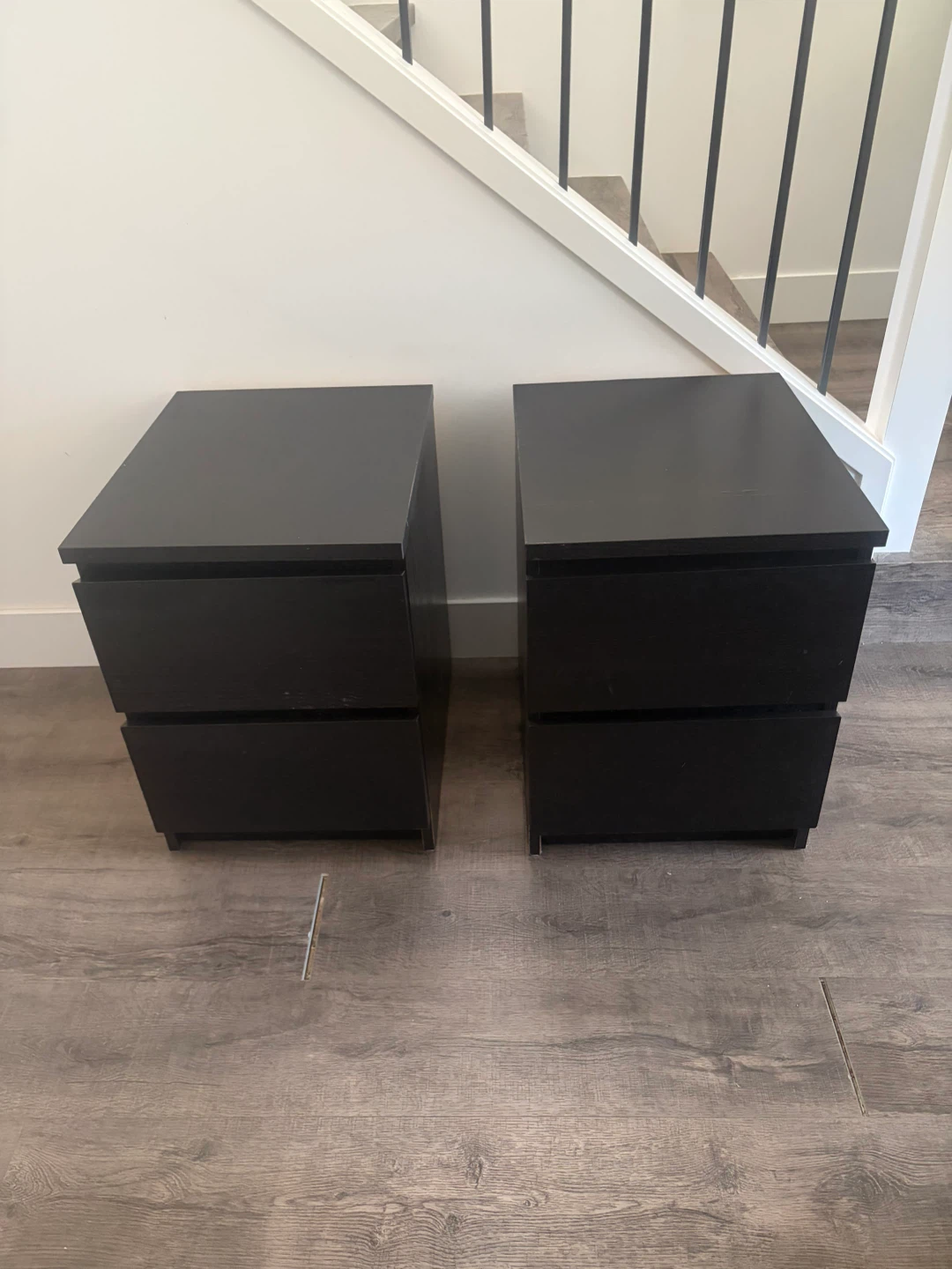 pair of IKEA nightstands black brown