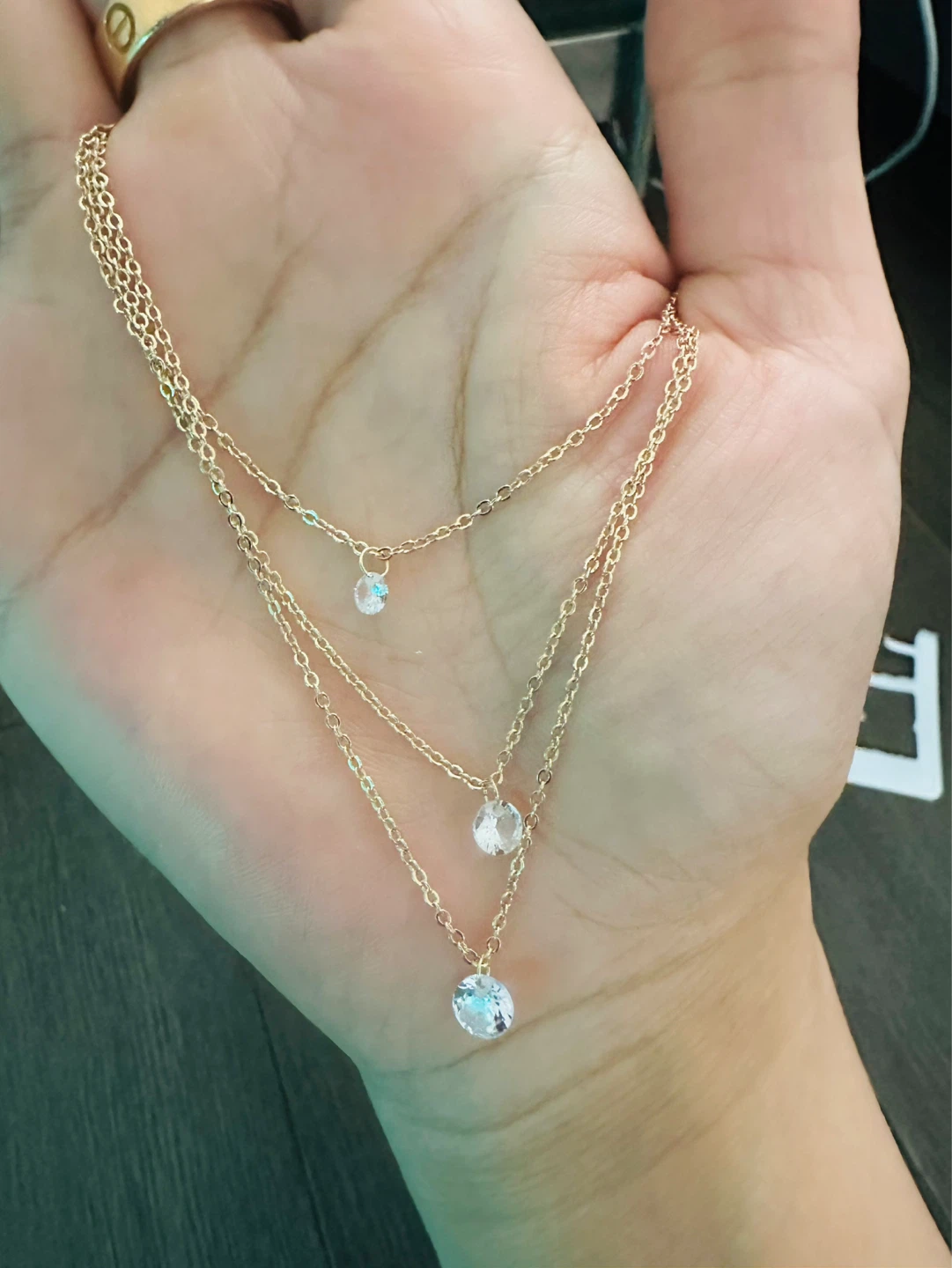 Gold layered necklace with clear crystals