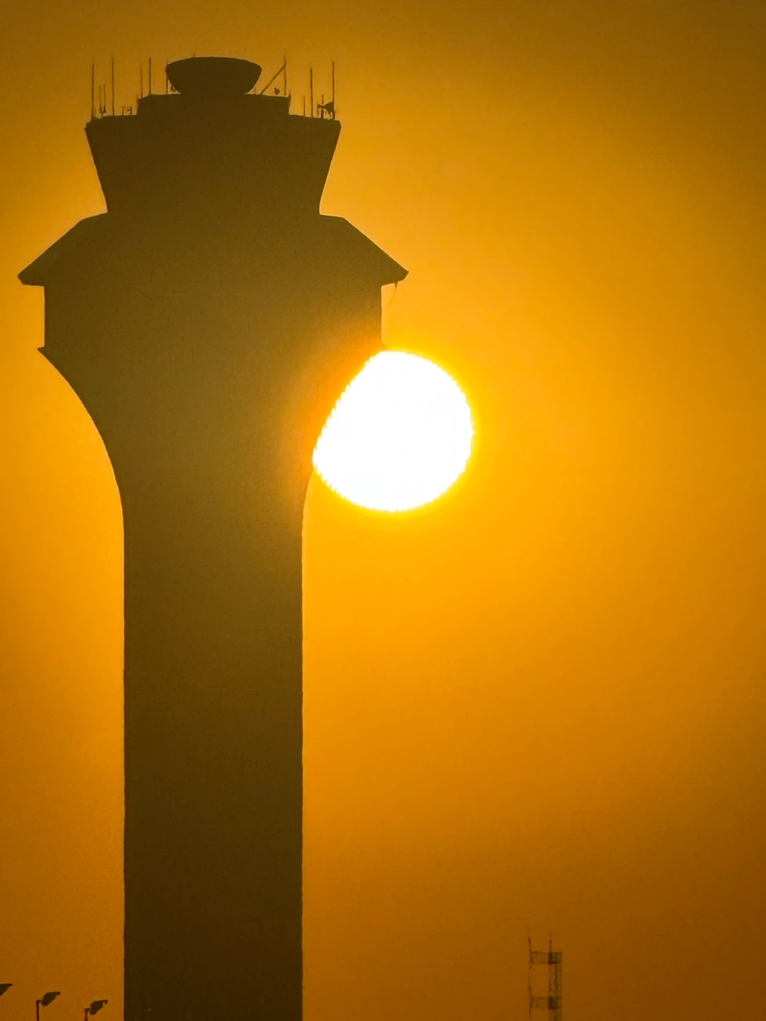 Control Tower Silhouette at Sunset
