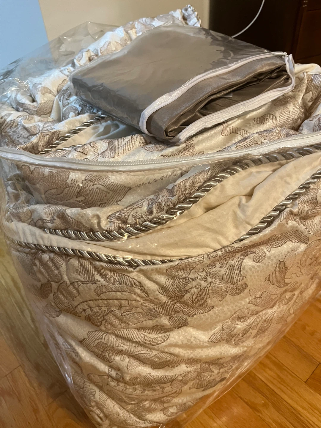 Damask comforter set with decorative trim