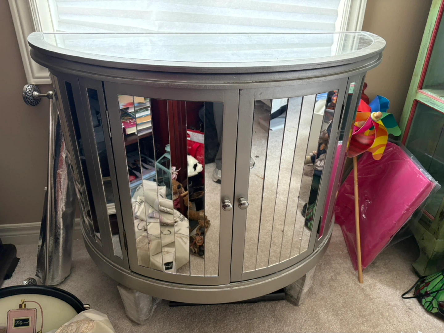 Mirrored Half-Moon Cabinet