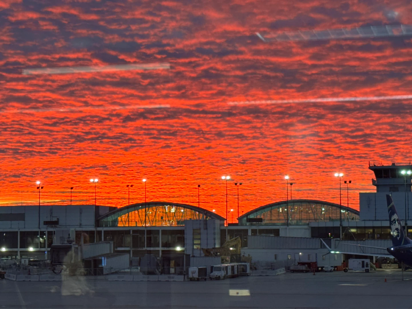 Vibrant Sunset Over Airport Terminal