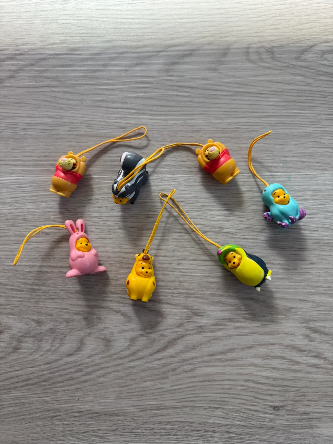 7 peek-a-Pooh keychains