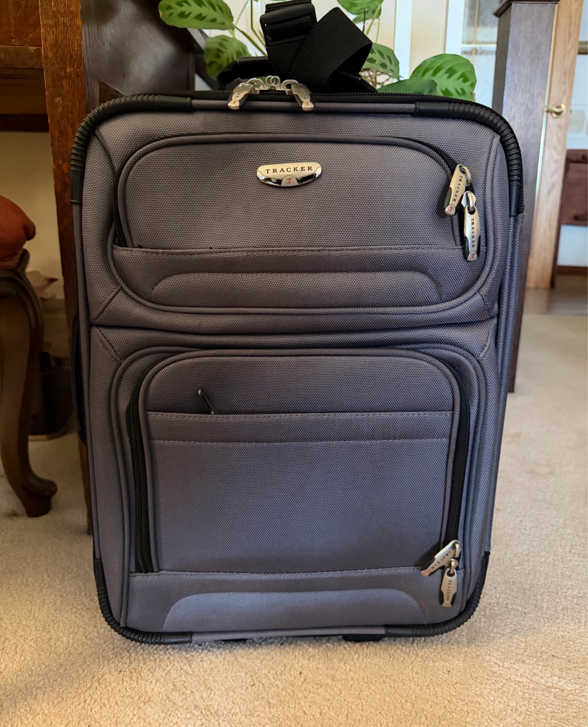 Grey Tracker carry-on suitcase