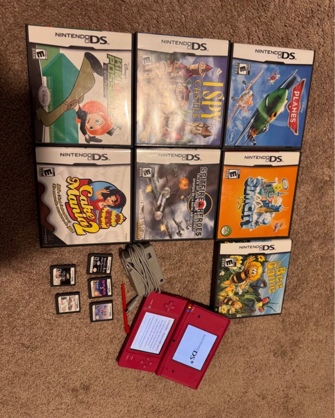 Nintendo DSi + 12 games