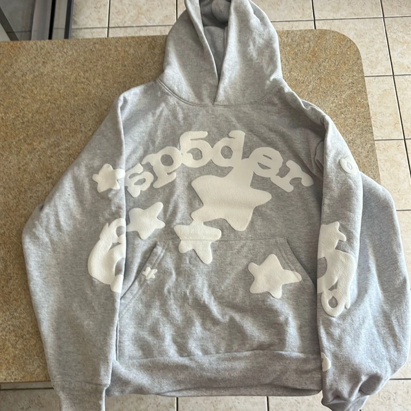 Grey Sp5der Hoodie with Star Design
