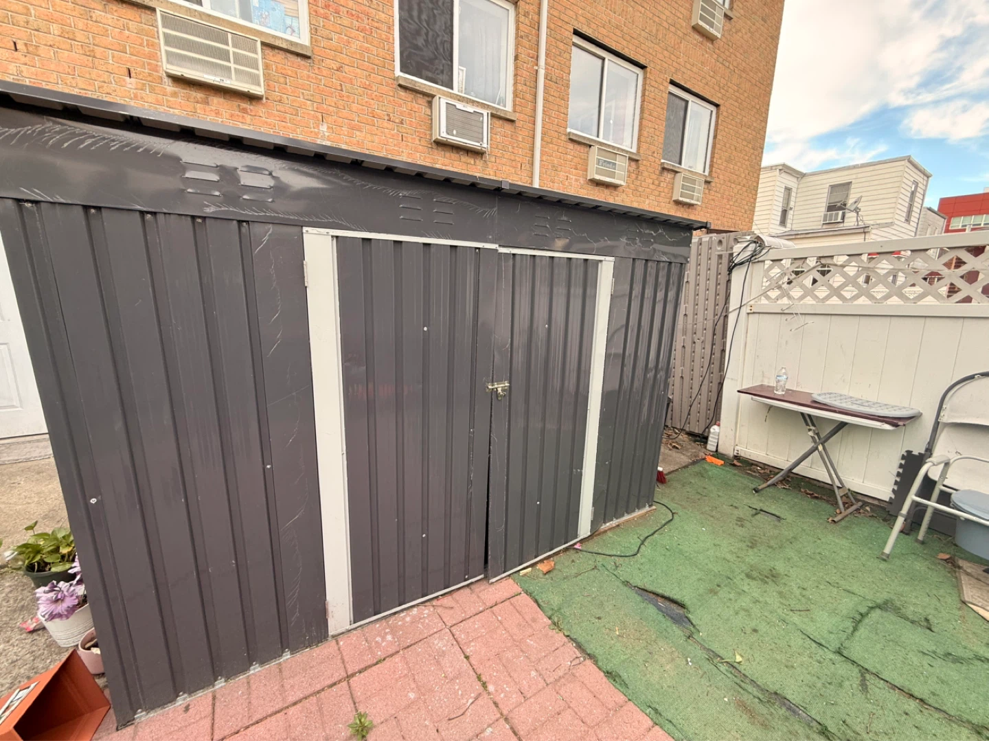Gray Metal Storage Shed
