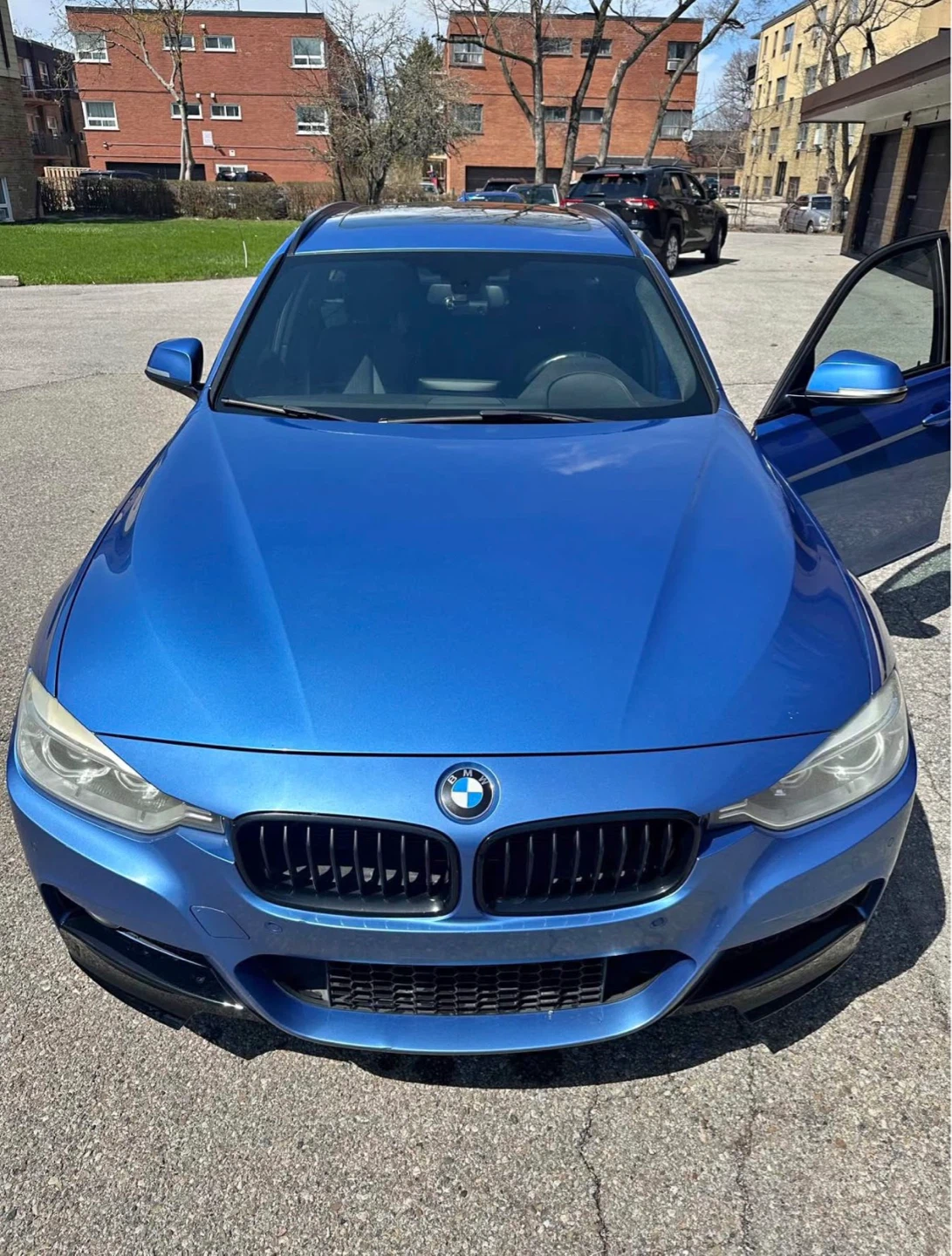 Blue BMW 3 Series Wagon