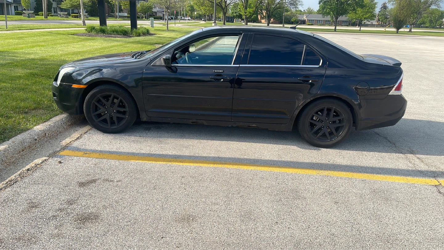 Black Ford Fusion Sedan