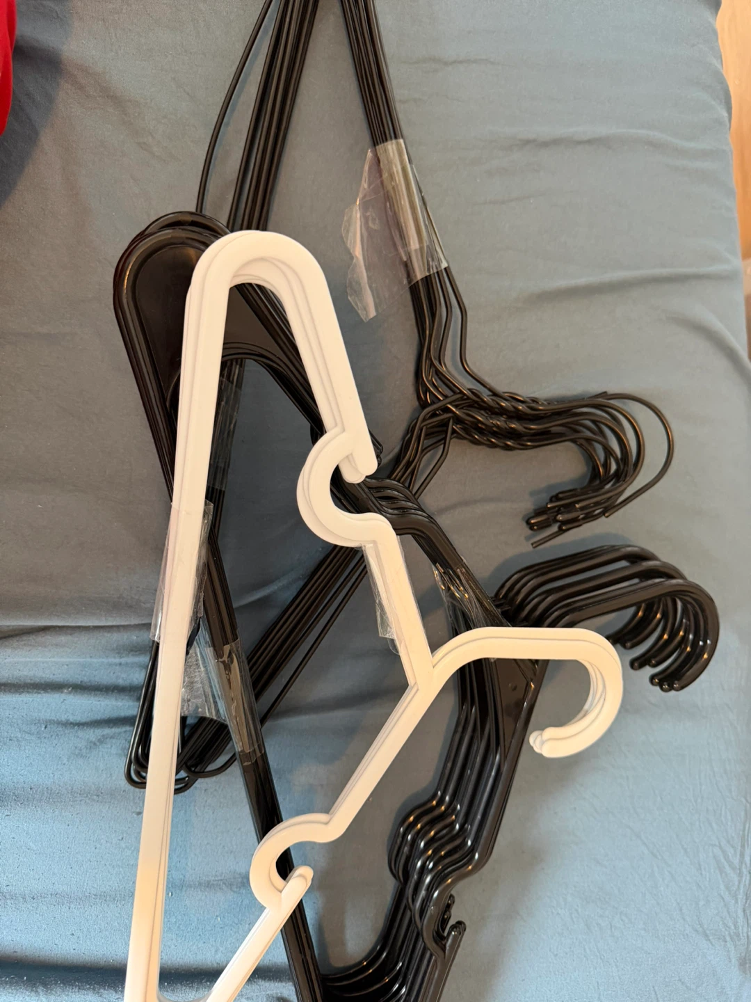 Bulk lot of plastic hangers - photo 3