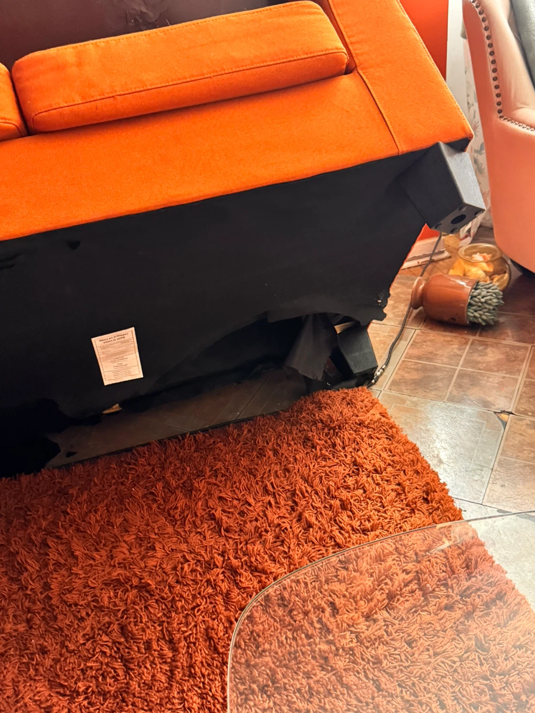 Orange Sofa with Pillows