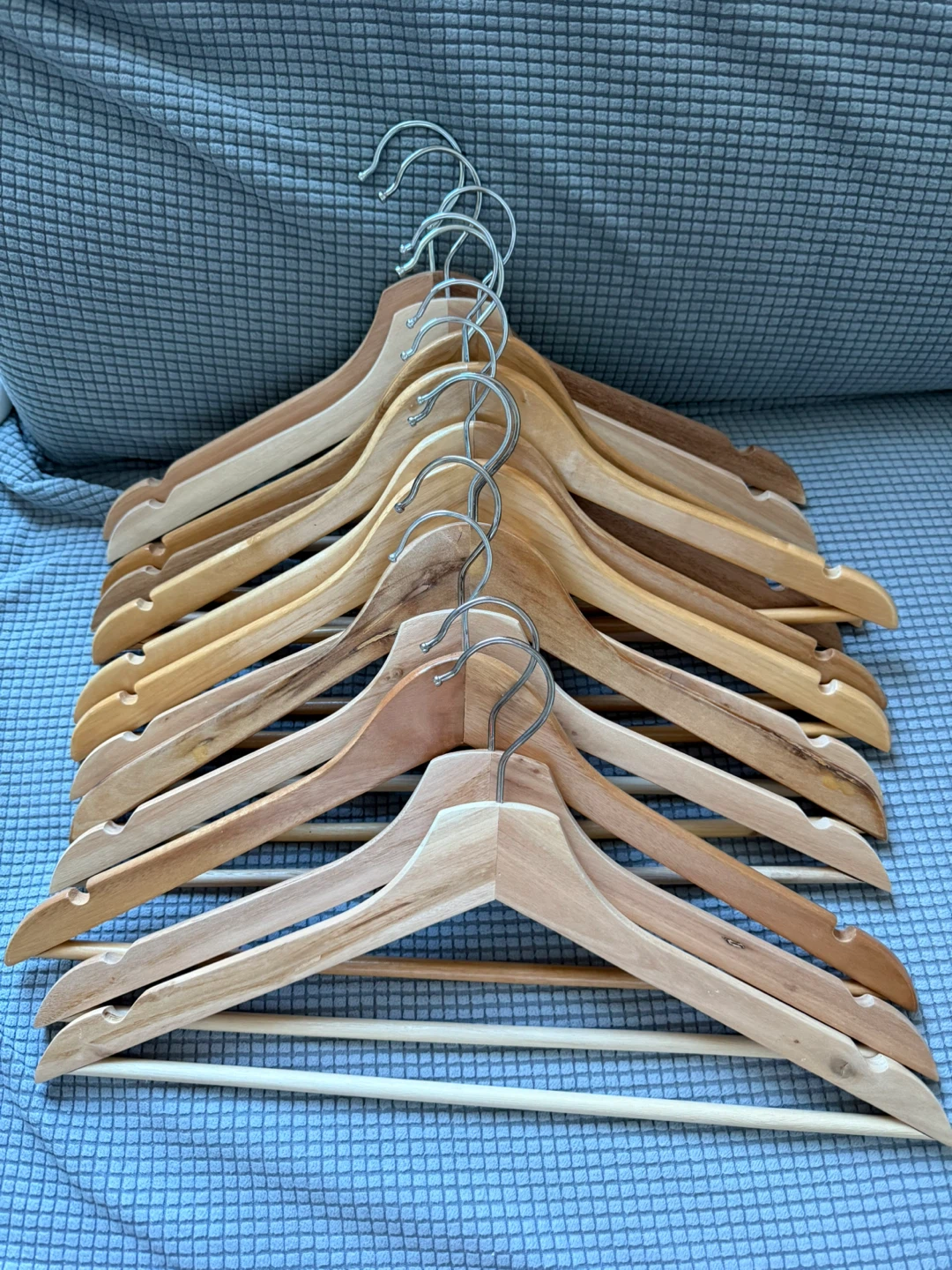 Bundle of wooden and velvet hangers