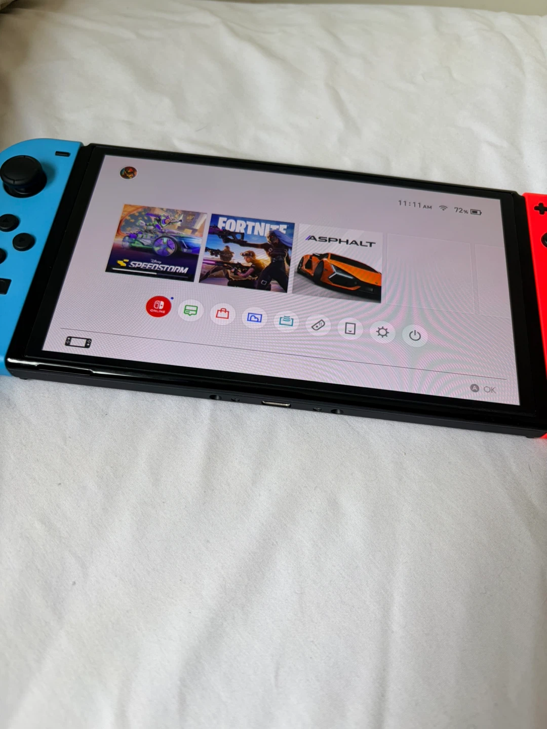 Nintendo Switch Console oled with Neon Red and Blue Joy-Cons
