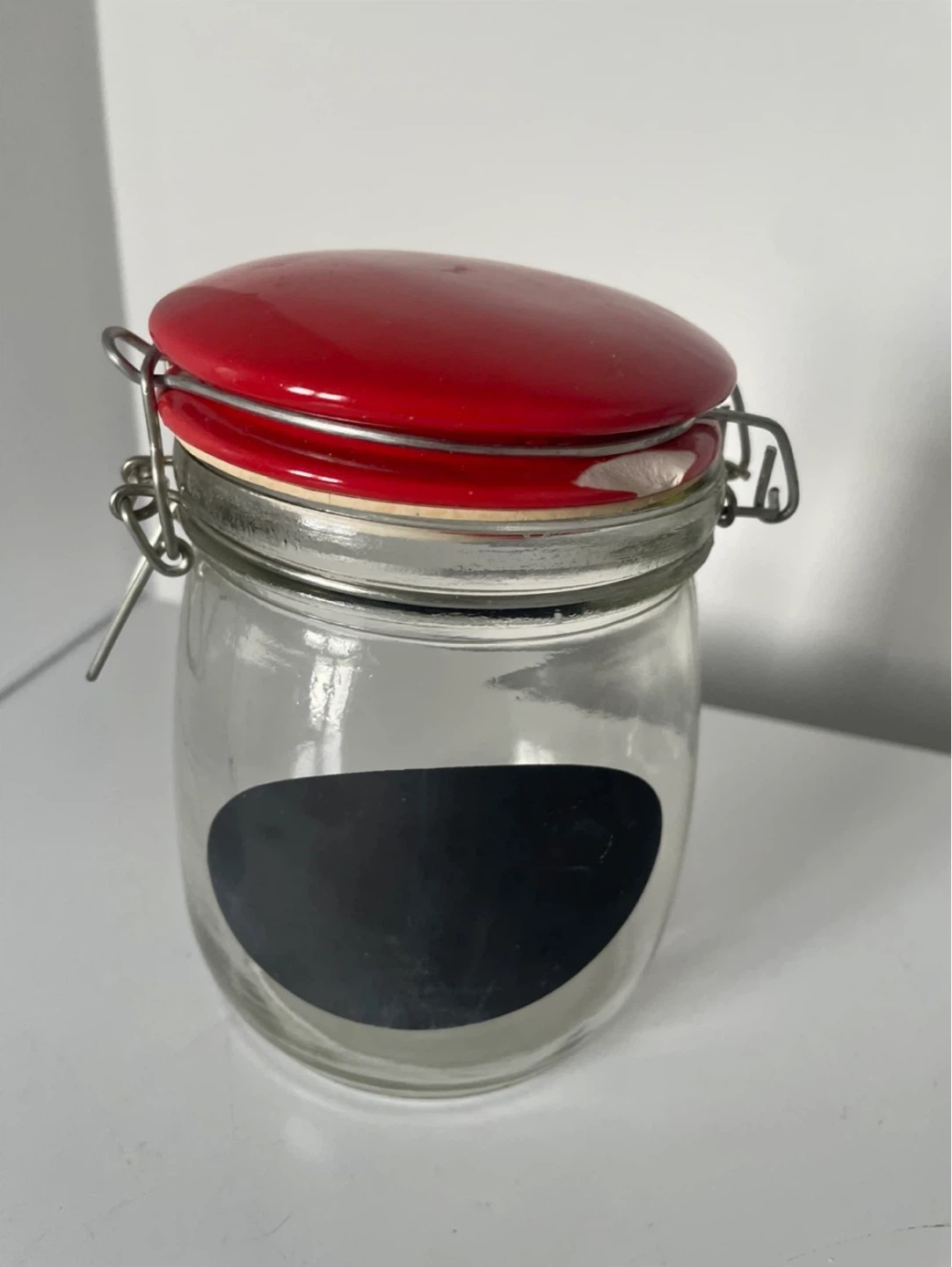 Glass Jar with Red Lid and Chalkboard Label