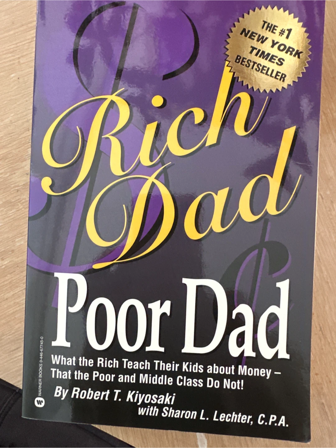 Rich Dad Poor Dad by Robert T. Kiyosaki & Sharon L. Lechter