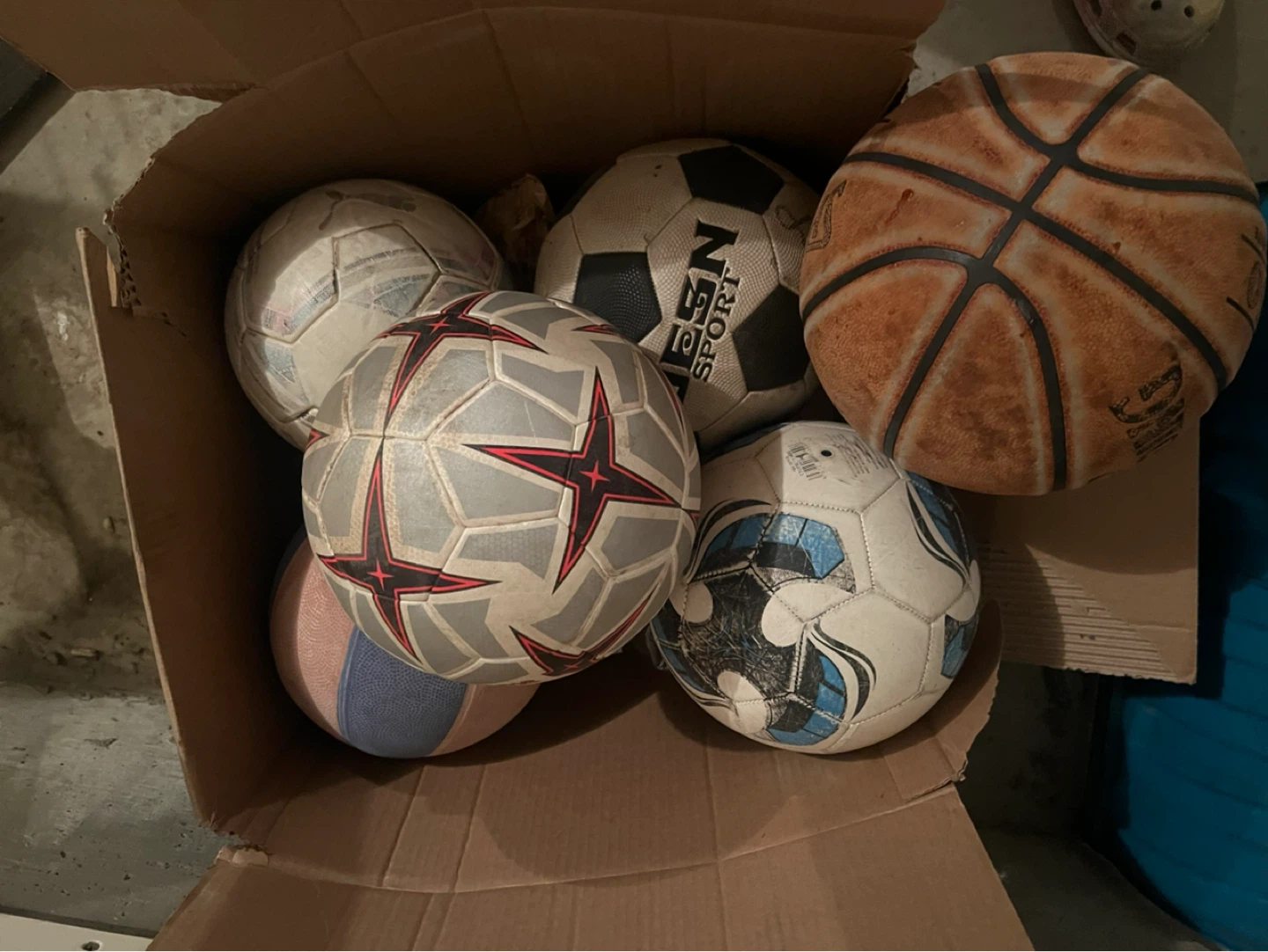 Assorted Soccer Balls and Basketball