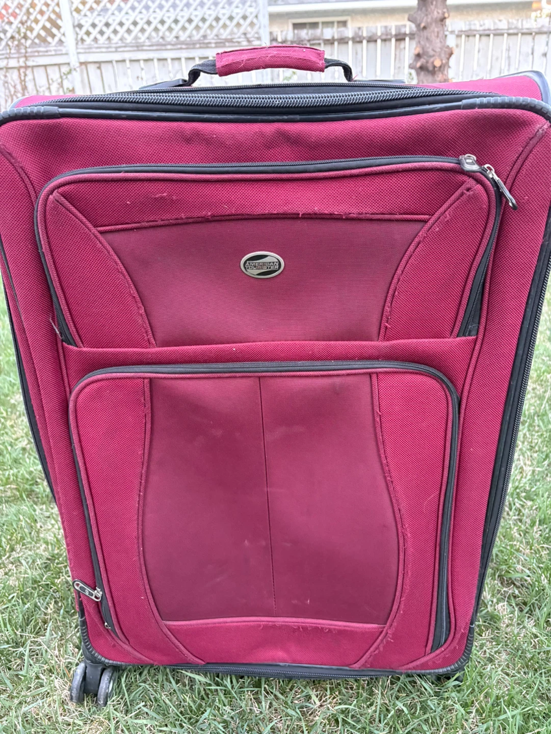 American Tourister Burgundy Rolling Suitcase