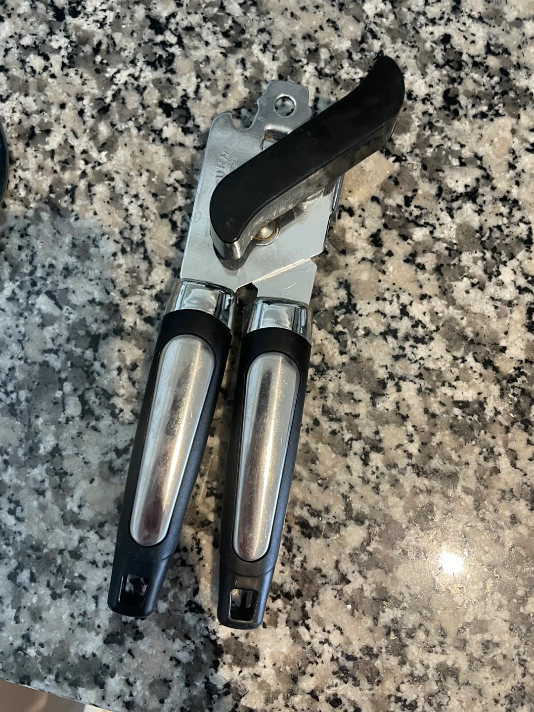 Manual Can Opener with Black Handle