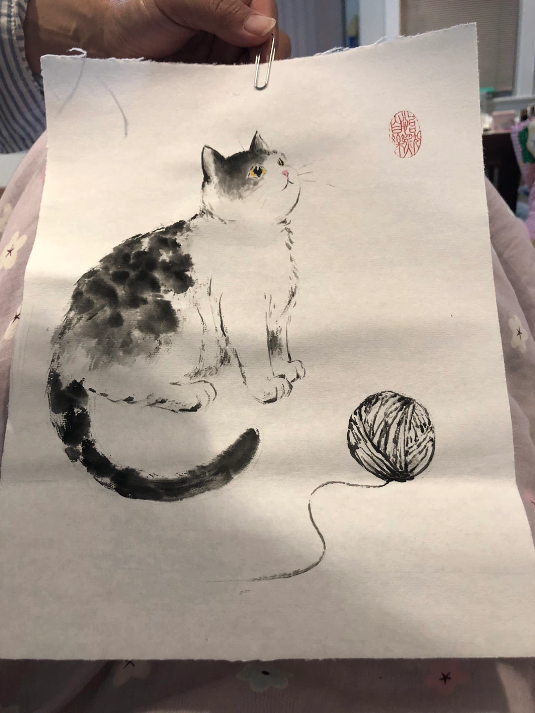 Ink Painting of a Cat with Yarn
