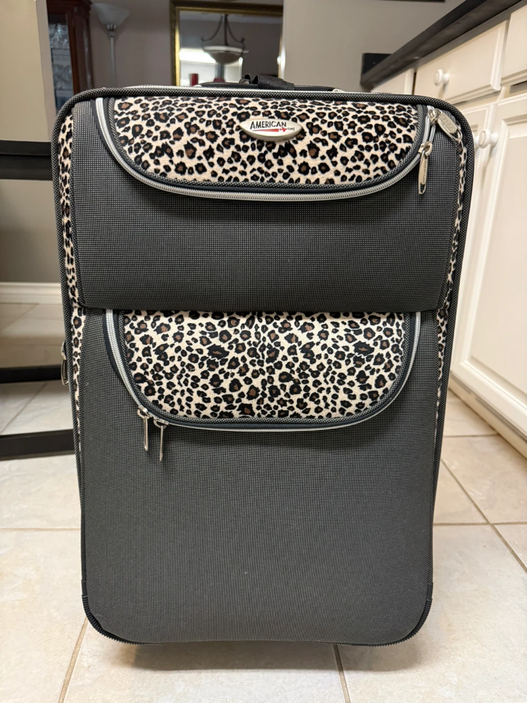 American Tourister Leopard Print Rolling Suitcase