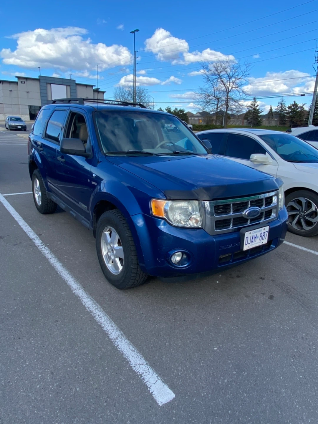 Blue Ford Escape SUV - photo 2