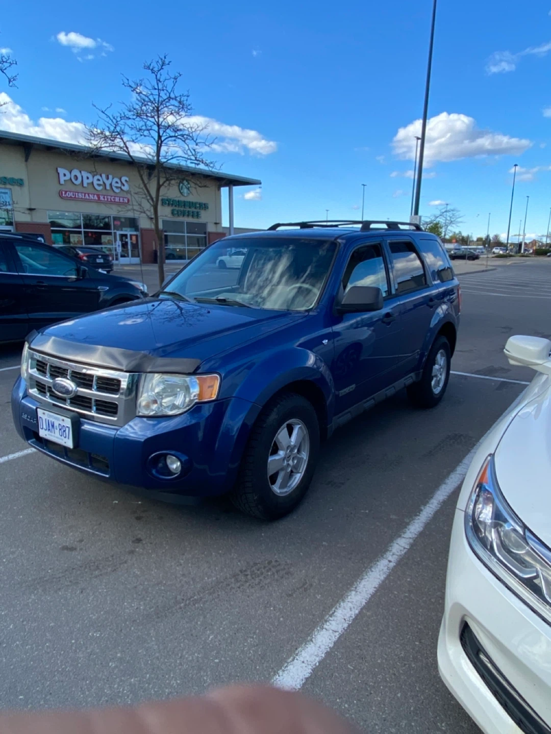 Blue Ford Escape SUV - photo 3