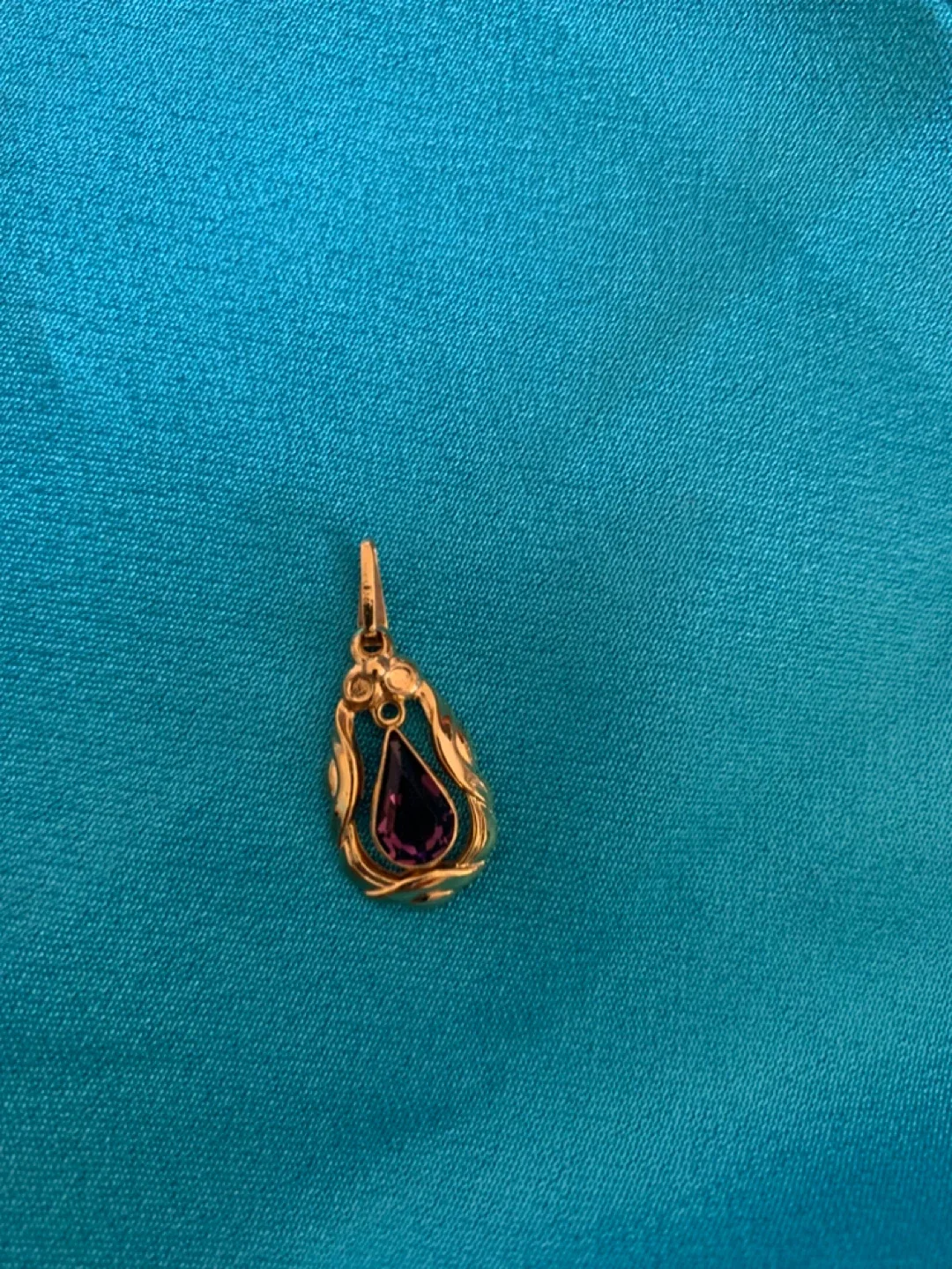 Gold plated pendant with Purple Gemstone