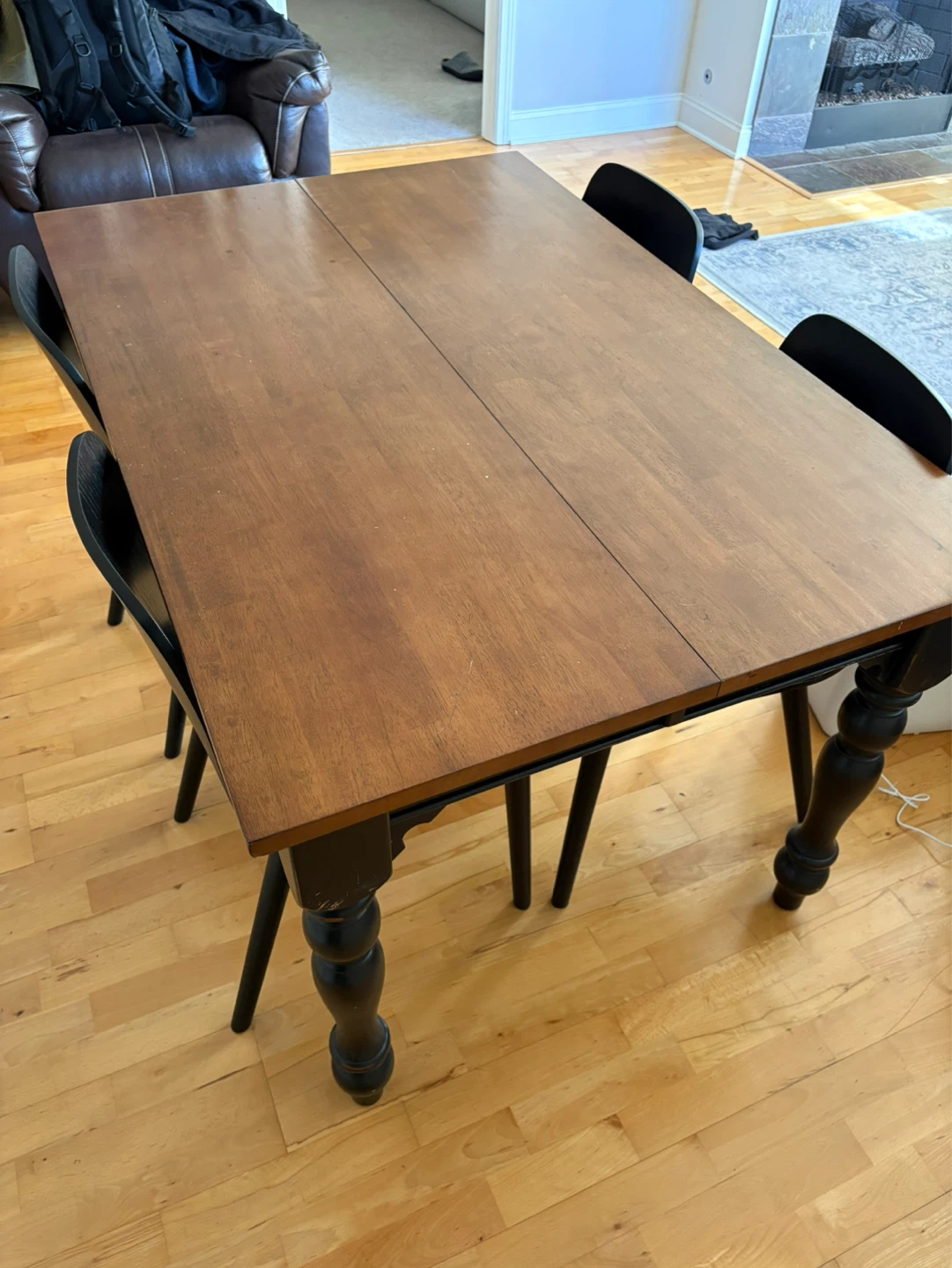 Wooden Dining Table with Black Turned Legs and chairs