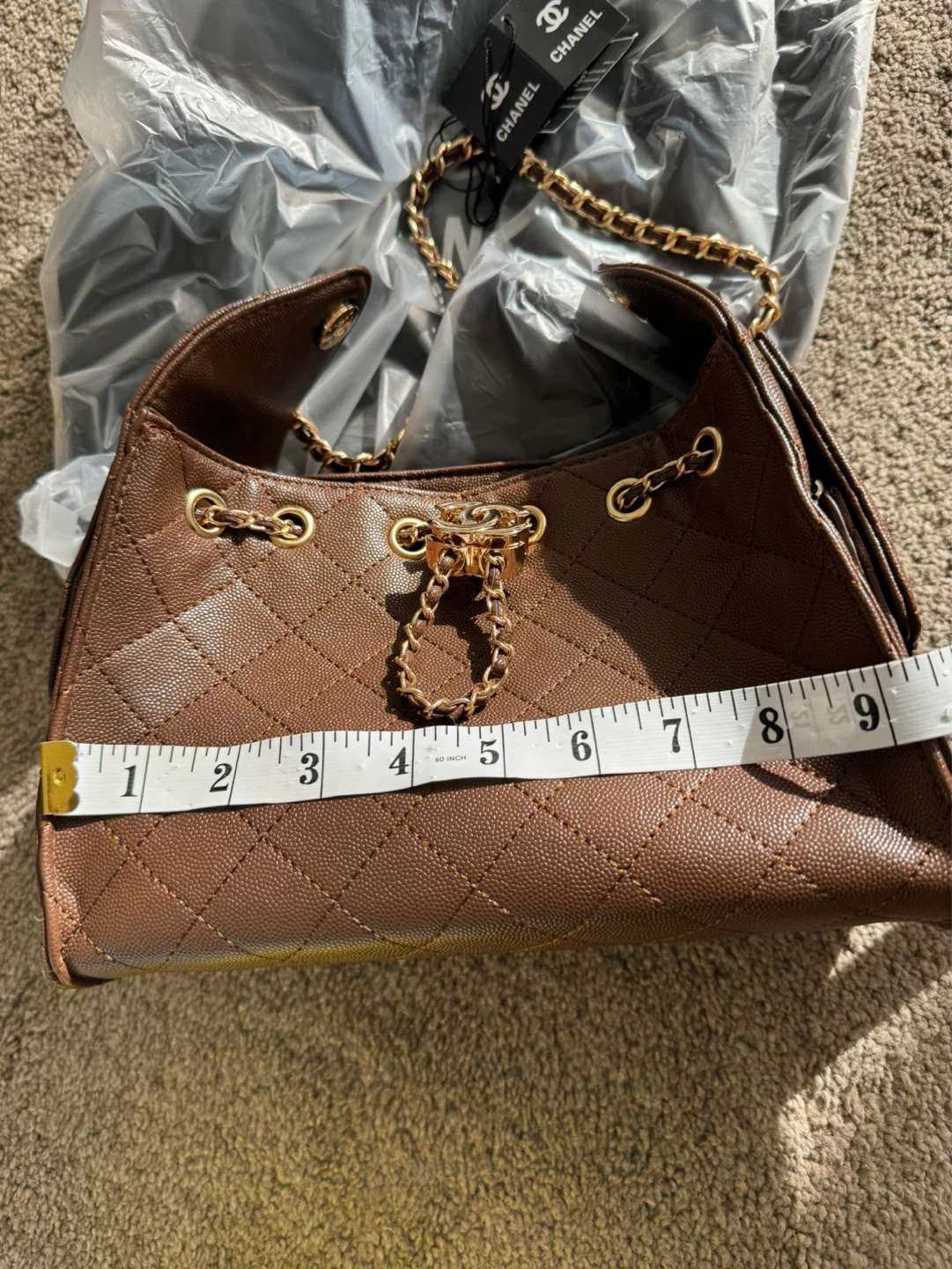 Cc Brown Quilted Leather Drawstring Handbag - photo 4