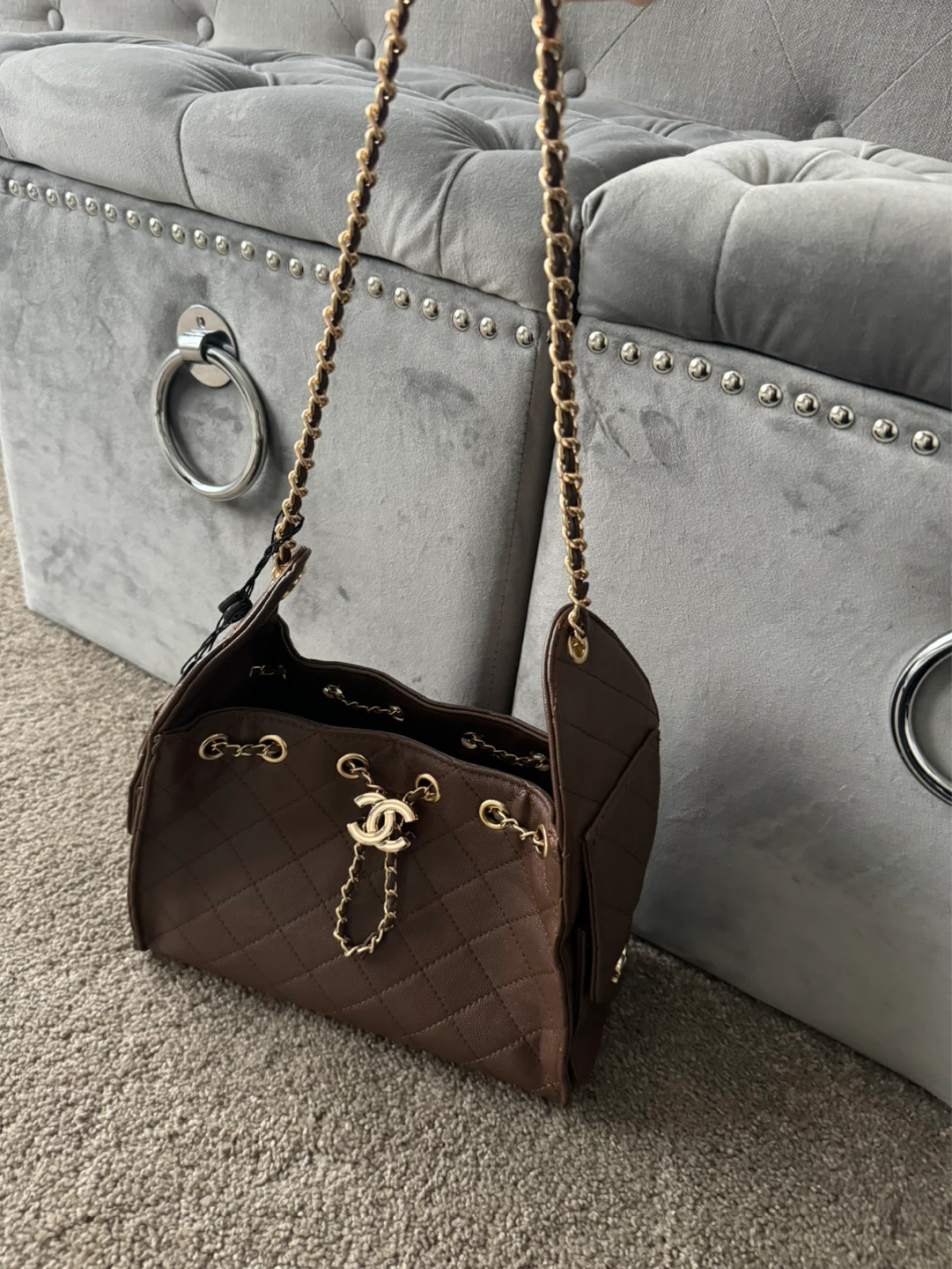 Cc Brown Quilted Leather Drawstring Handbag