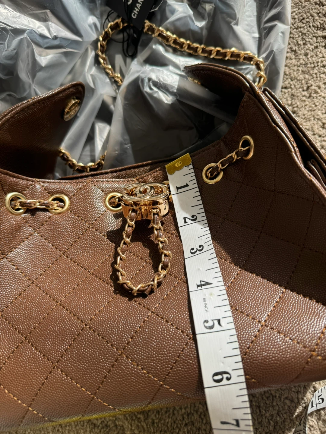 Cc Brown Quilted Leather Drawstring Handbag - photo 5