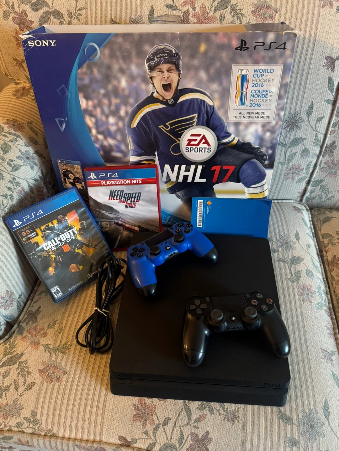 Sony PlayStation 4 Slim 1TB Console with 2 Controllers and Games