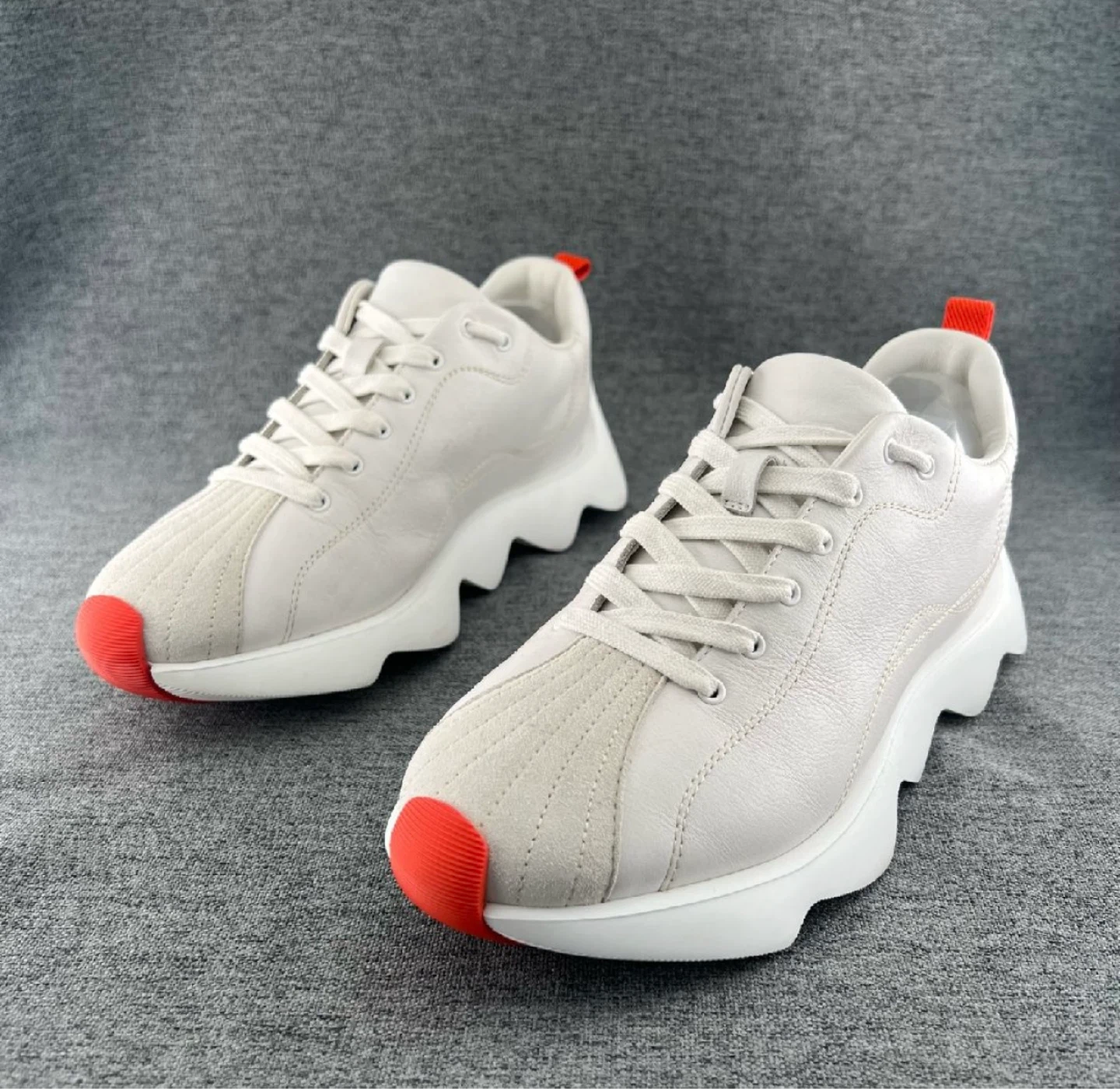 Authentic- Hermès White Leather Sneakers with Orange Accents