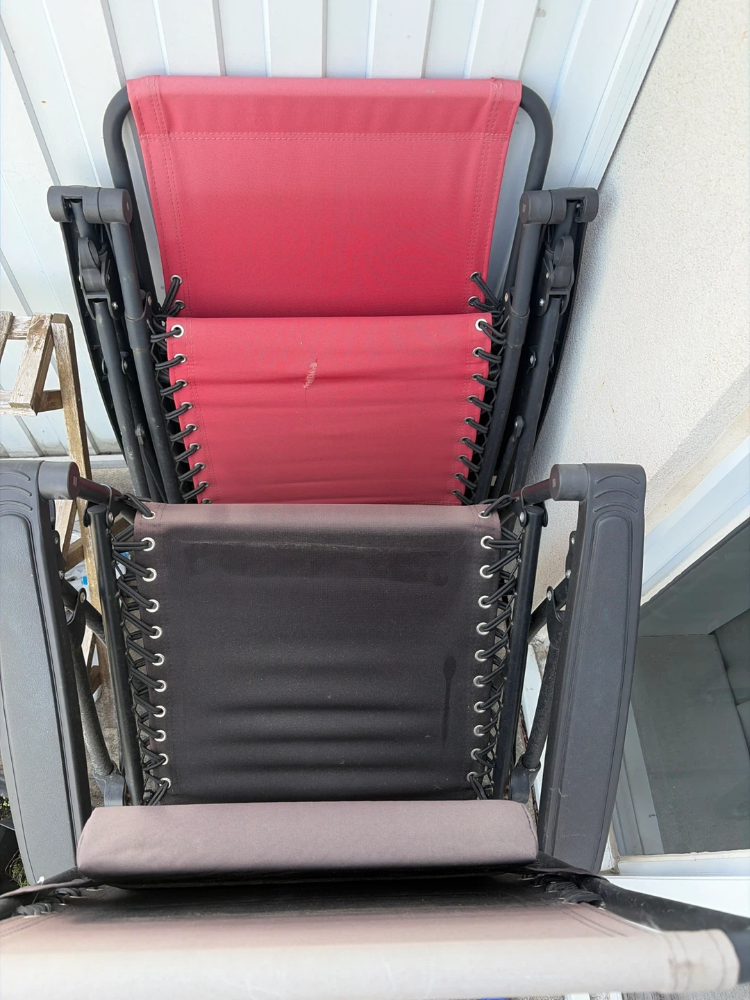 Two Zero Gravity Chairs - Red, Black, and Grey