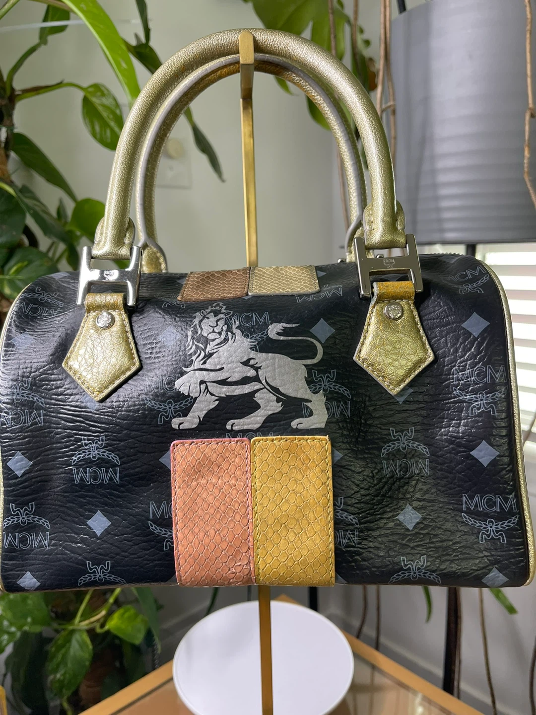 MCM Boston Bag Black Monogram with Lion Detail