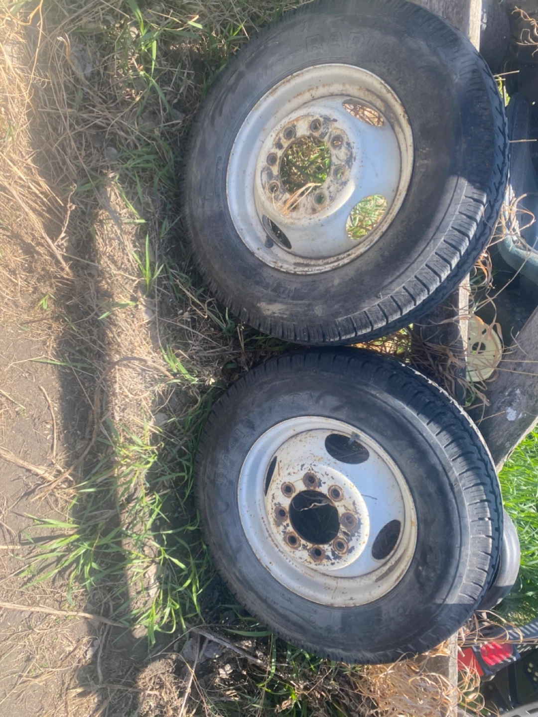 Two tired and rims from a F-350 Motorhome